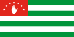 seven green-white stripes with a red canton containing a white hand and 7 stars