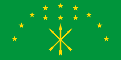 green with three crossed yellow arrows under an arc of 12 yellow stars
