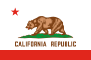 white, a thin bottom red stripe, a bear, the words CALIFORNIA REPUBLIC, and a red star at top-left