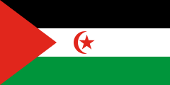 black-white-green stripes with a red triangle and a red crescent and star in the middle