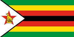 green-yellow-red-black-red-yellow-green with a bird emblem on a white triangle outlined in black